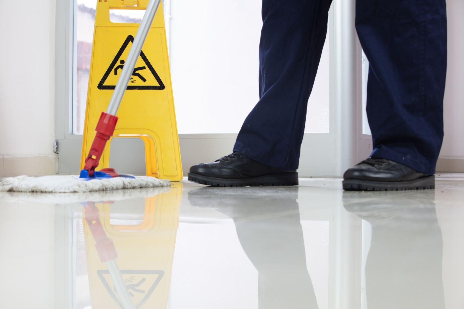 Someone mopping the floor